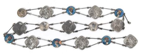 An Egyptian Revival white metal and enamelled belt: with alternating square and circular panels