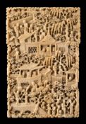 A late 19th century Cantonese ivory card case: decorated with figures in a pagoda landscape 10.5cm.