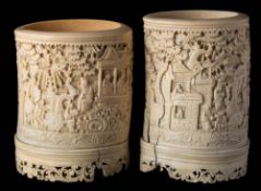 A Cantonese carved ivory brush pot: decorated in the traditional manner of figures in a pagoda