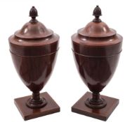 A pair of late 19th Century mahogany and inlaid cutlery urns in the Neo Classical taste:,