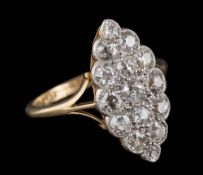 A diamond marquise-shaped cluster ring: pave-set with round old,