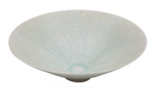 A Chinese Qingbai porcelain bowl: of flared conical form, covered in a crackled pale celadon glaze,