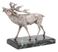 A George V Continental silver model of a stag, bears import marks for London,