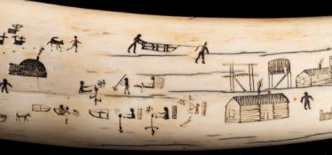 A late 19th/early 20th century Inuit carved walrus tusk:, unsigned,