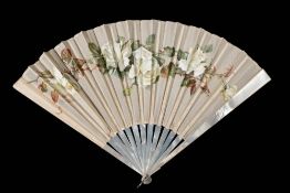 A late Victorian mother-of-pearl and silk fan: the painted silk leaf decorated with roses and