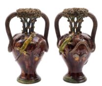 A pair of Portugese Palissy Ware vases: attributed to Manuel Mafra each of baluster form the