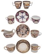 A group of New Hall hardpaste and bone china tea and coffee wares: in underglaze blue and gilt tree