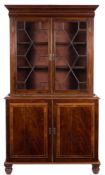 A mahogany and crossgrained bookcase:,