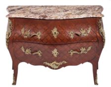 A French kingwood parquetry and gilt brass mounted serpentine fronted bombe commode in the Louis XV