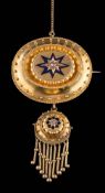 A 19th century gold and diamond oval brooch: with central blue enamelled eight-point star centring