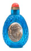 A Chinese Peking blue glass snuff bottle: of ovoid form with beaded woven design,