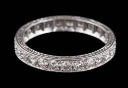 A diamond eternity ring: pave-set with round brilliant-cut diamonds estimated to weigh a total of 1.