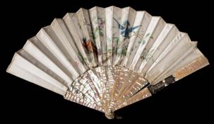 A late Victorian mother-of-pearl and silk fan: the painted silk leaf decorated with finches amongst