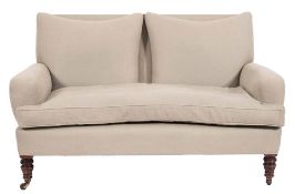 By Shoolbred, London - An Edwardian twin seat settee:, fully upholstered in grey fabric,