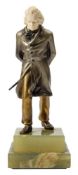 An Art Deco period bronze and ivory figure of Beethoven: wearing a frock coat with hat and walking