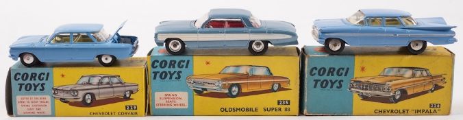 Corgi No 220 Chevrolet Impala, light blue:, together with No 235 Oldsmobile Super 88,