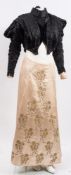 A Victorian black satin and sequins jacket: with puff ball sleeves and bodice panelling together
