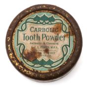 An early 20th century unopened tin of 'Carbolic Tooth Powder':,