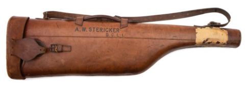 A brown leather leg o' mutton gun case: with personalised inscription, A.W. Stericker, D.C.L.I., 80.