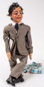 A mid 20th century ventriloquist's dummy 'Jimmy':, the head with applied wig ,