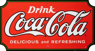 A late 20th century Coca-Cola enamel advertising sign:, circa 1970s,