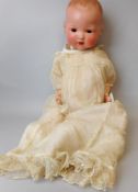 An Armand Marseille doll:, the head impressed, AM. Germany. 331/6K.