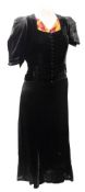 Three black velvet evening dresses:, a gold silk evening dress by Wallis,