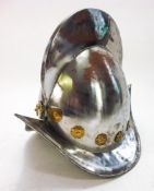 A reproduction Spanish morion helmet:, with high comb and brass decoration, 28cm high.