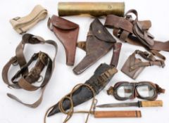 A WWI period Sam Brown belt with sword frog and two associated leather pistol holsters:,