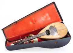 Antonio Salvino, Napoli, an inlaid eight string mandolin, c1950:, with label to interior,