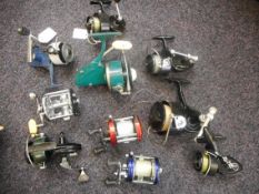 A collection of various fishing reels:, including a Mitchell 386 an Abu Garcia and others (a lot).