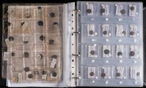 An album of mainly lower grade Roman coins with a few world coins:, (a lot).