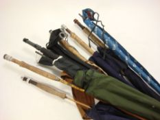 Daiwa and others. A group of nine various graphite and split cane rods.