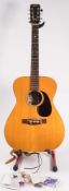 A Japanese K Susuki Co, 'Folk' acoustic guitar, model number 9582:, together with accessories.