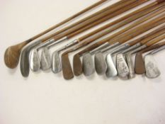A group of early 20th century golf clubs:, including an Alex Aitken Super mashie,