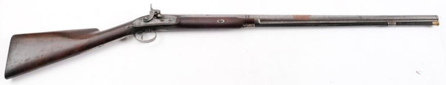 A 19th century English percussion cap fowling gun:,