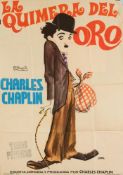 A Spanish single sheet film poster for the re-release of Charlie Chaplin 'La Quimera del Oro' (The