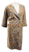 A mid-20th century satin style coat with floral decoration:, together with a wool skirt,
