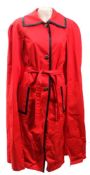 A red overcoat cape by Harrods, London:, together with a black velvet smoking jacket by Hobbs,
