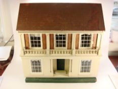 A late 19th century painted pine doll's house:,