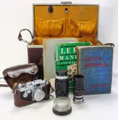 A Leica model IIIG camera:,