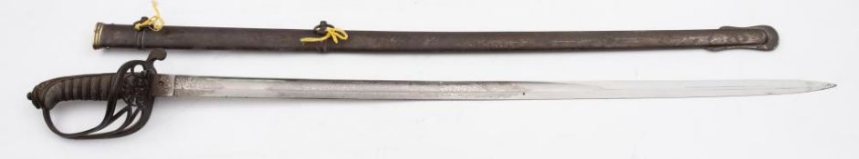 A Victorian Infantry Officer's dress sword: the straight single edged blade with acid etched