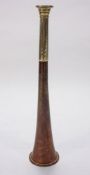 A copper and silver plated 'The Earl of Harrington' hunting horn by Kohler& Son, London:, 24.