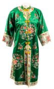 A Chinese green silk and embroidered coat:, together with a peach house coat, a yellow house coat,