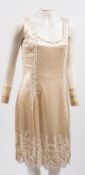 A cream silk and diamonte beaded flapper dress:,