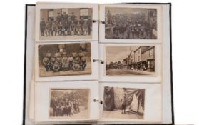 An album of early 20th century postcards and photographs of Dartmouth and environs:.
