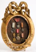 A framed group of six foreign miniatures: Legion DHonneur, The Order of Merite Agricolem,