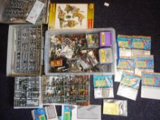 A collection of Tamiya and other partially complete figures: accessories including photo etched