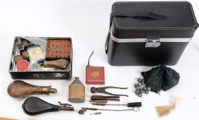 Two copper and brass powder flasks:,together with a leather shot flask, a riding crop,