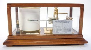 A mahogany cased barograph with retailer's label for M W Dunscombe, Bristol:,